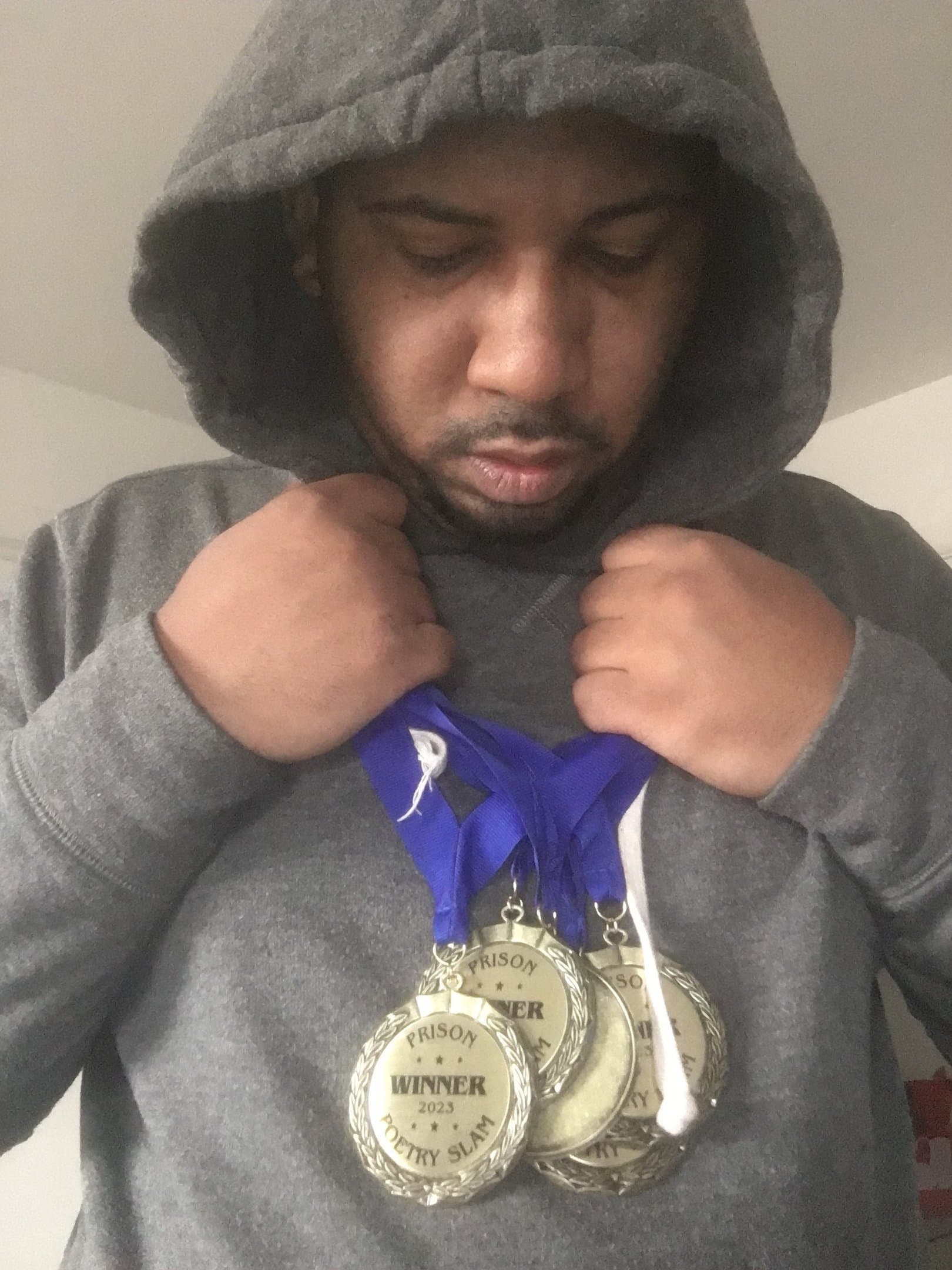 Portrait of Wesley Robinson wearing performance medals