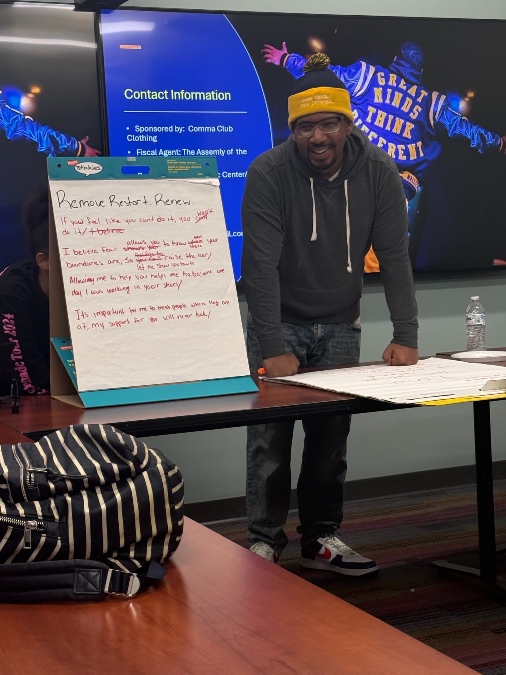 Wesley Robinson presenting to a room